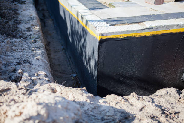 Professional Interior Drainage System technician working in Dayton, KY